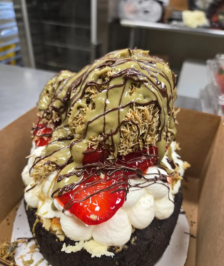 An elaborate specialty whole cheesecake